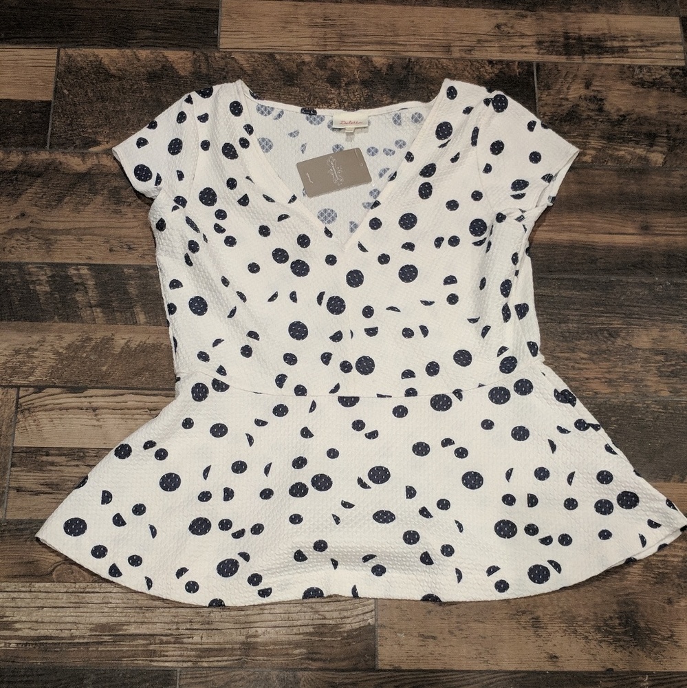 Anthropologie peplum top by Deletta